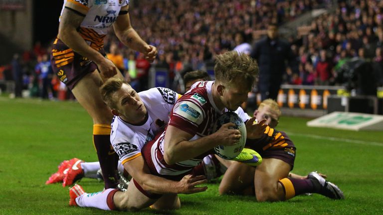 Dan Sarginson  goes over for Wigan's first try