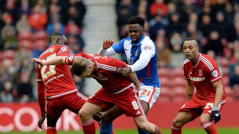 Hope Akpan is crowded out by Middlesbrough players