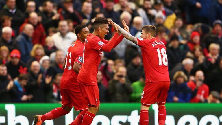 Roberto Firmino (middle) celebrates his opening goal