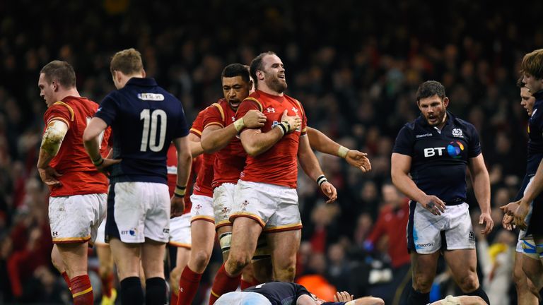 Jamie Roberts is congratulated by Taulupe Faletau after scoring Wales' second try