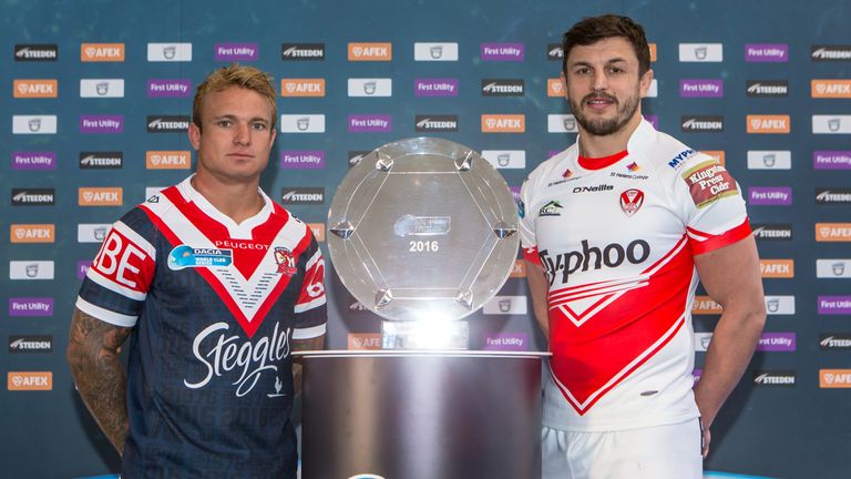 Jake Friend and Jon Wilkin pose with the World Club Series trophy