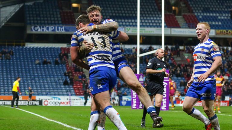 Josh Charnley celebrates his late try with Sean O'Loughlin