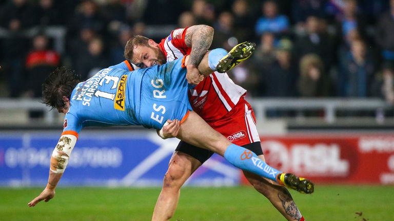 Josh Griffin tackles St Helens' Louie McCarthy-Scarsbrook