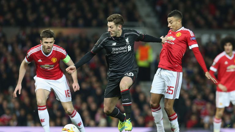 Adam Lallana tries to find space