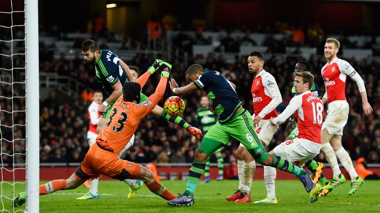 Petr Cech cannot stop the Swansea skipper scoring