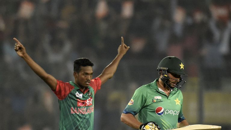 Bangladesh's Al-Amin Hossain reacts after the dismissal of Pakistan cricket captain Shahid Afridi
