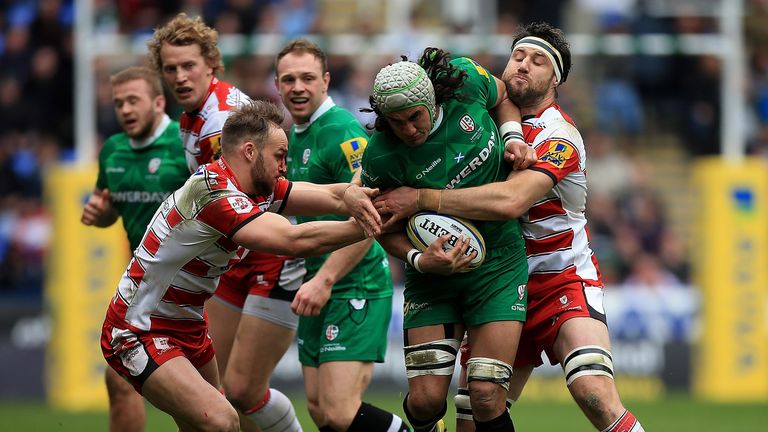 Blair Cowan of Irish powers through the Gloucester defence