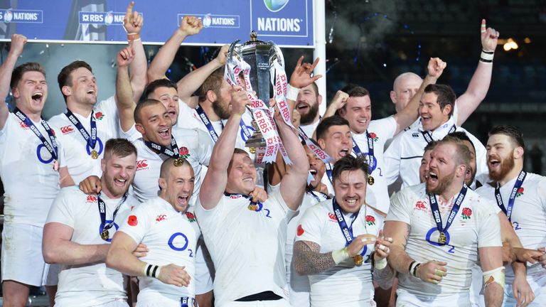 Dylan Hartley lifts the Six Nations trophy after England won the Grand Slam
