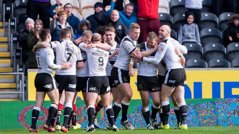 Hull FC celebrate Kirk Yeaman's try against Warrington