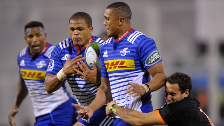 Stormers' centre Juan de Jongh (middle) on the charge