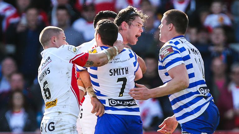 Louie McCarthy-Scarsbrook and Joel Tomkins clash