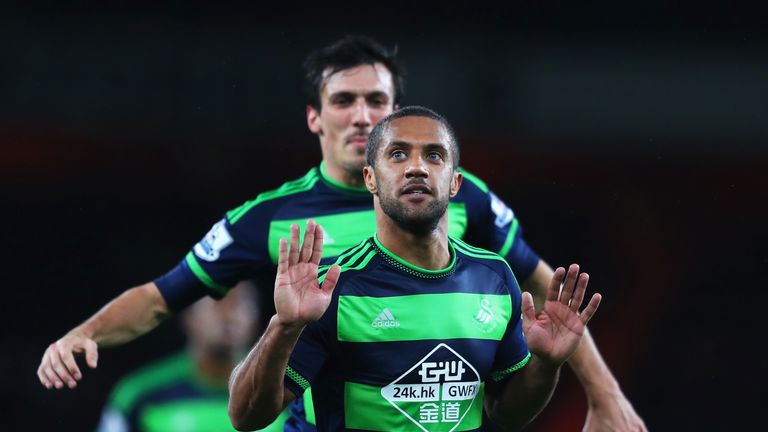 Wayne Routledge celebrates after scoring against Arsenal