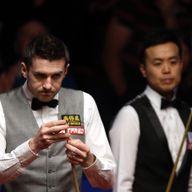 Mark Selby (left) and Marco Fu were involved in a marathon semi-final battle at the World Championship