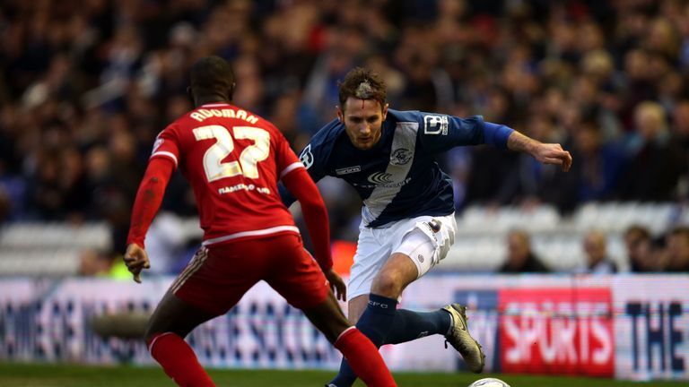 Birmingham City's Jonathan Grounds and Middlesbrough's Albert Adomah battle for the ball