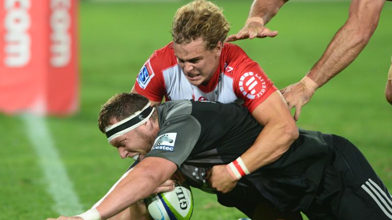 Wayatt Crockett scores one of Crusaders' six tries against the Lions 