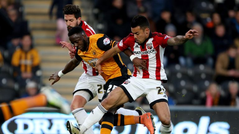 Adama Diomande (left) and Josh Clarke challenge for the ball during the Hull victory.