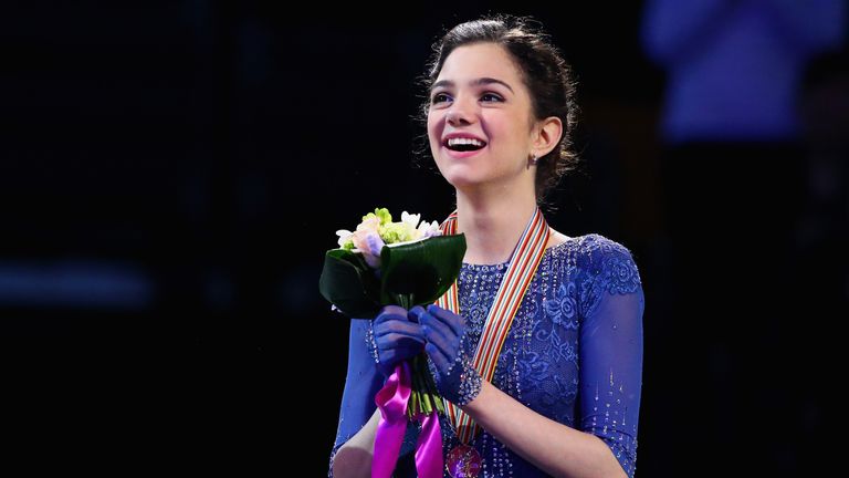 Phenom Evgenia Medvedeva of Russia celebrates after winning the gold medal