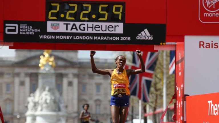 Sumgong crosses the finish line to win the Elite Women's race