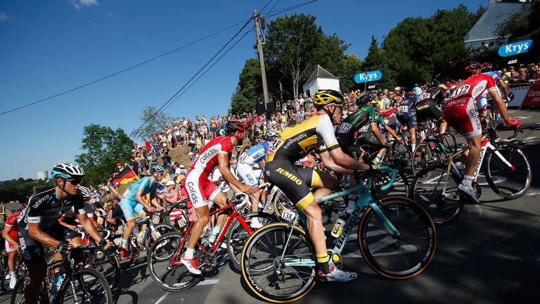 The peloton makes the climb of the Mur de Huy to the finish of stage three of the 2015 Tour de France