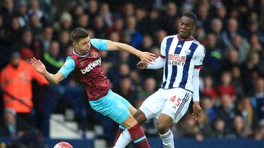 Image of Jonathan Leko (right) battles for the ball with West Ham's Aaron Cresswell.