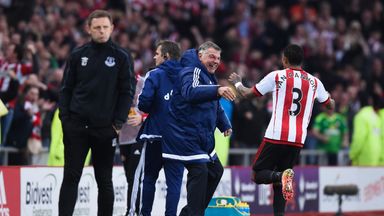 Sam Allardyce celebrates with Sunderland defender Patrick van Aanholt