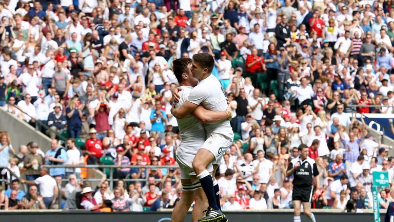 England's Jack Clifford (left) celebrates scoring their fourth try of the game 