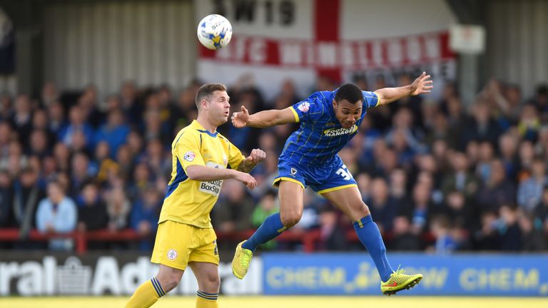Darius Charles (right) and Accrington's Billy Kee battle for the ball