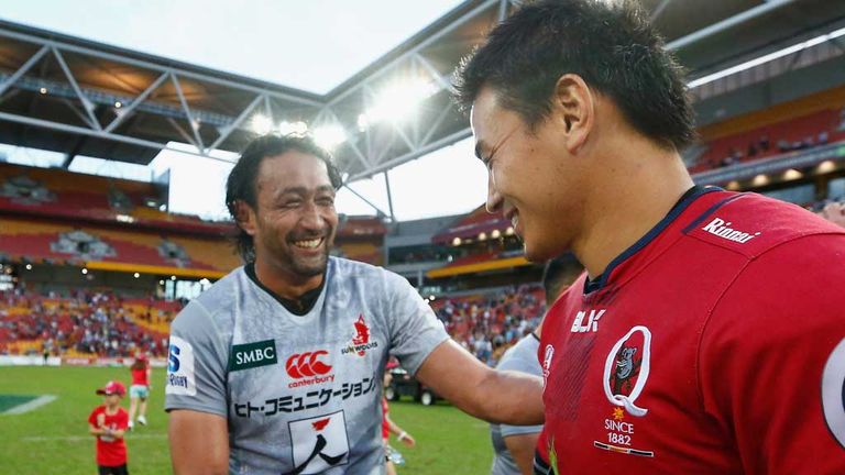 All smiles at the whistle as Ayumu Goromaru of the Reds (right) shakes hands with Hitoshi Ono