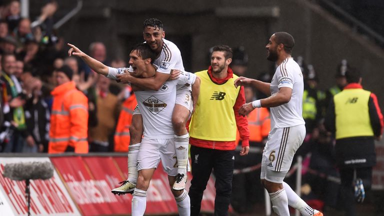 Cork celebrates his brilliant goal at the Liberty Stadium