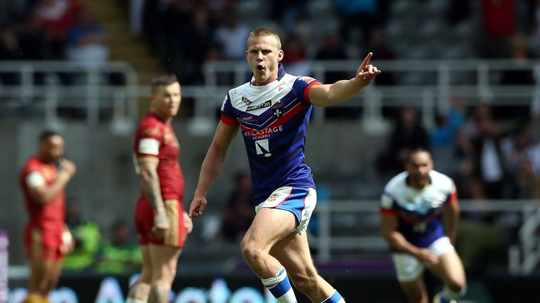 Wakefield's Jacob Miller celebrates his winning drop goal during the Super League Magic Weekend