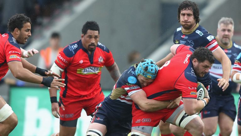 James Phillips attacks for Bristol as he is tackled by  Alex Shaw of Doncaster Knights