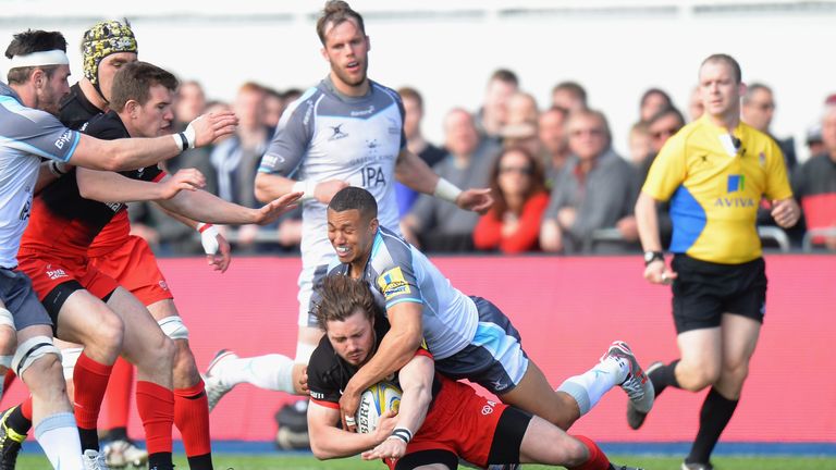 Marcus Watson brings down Ben Ransom in an impressive first-half performance by the winger