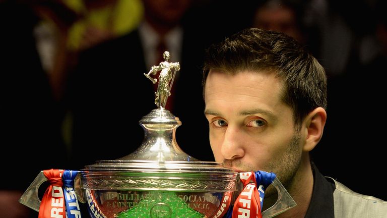 Selby lifts the trophy after beating Ding Junhui to win the World Snooker Championship