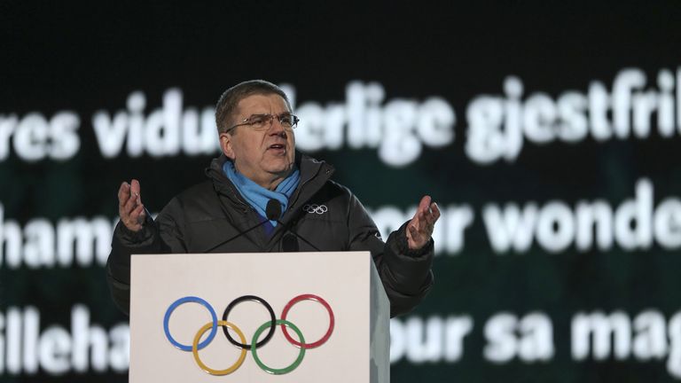 IOC President Thomas Bach suggests a compromise that would allow some competitors to enter Rio 2016