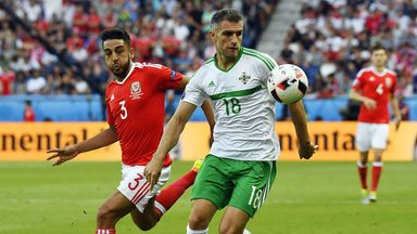 Image of Aaron Hughes in action action against Wales during  the Euro 2016 finals