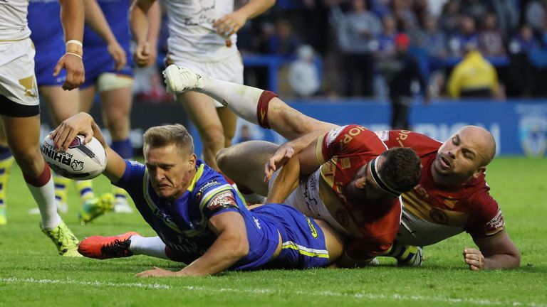 Warrington Wolves' Brad Dwyer scores his side's fourth try