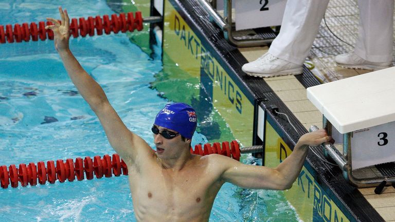 Britain's James Cooke celebrates winning his heat during the men's semi-final round at the modern pentathlon European Championships