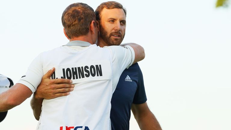 Johnson celebrates his US Open success with his brother and caddie Austin