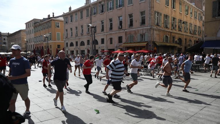 England fans flee from violence reportedly instigated by Russian hooligans
