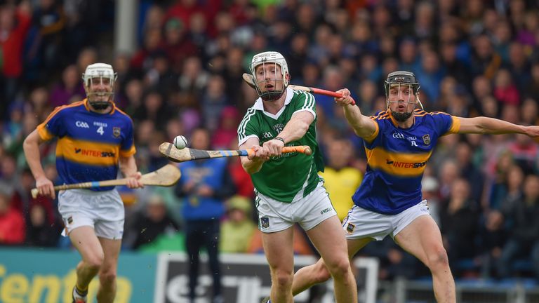 Cian Lynch of Limerick in action against Michael Breen of Tipperary
