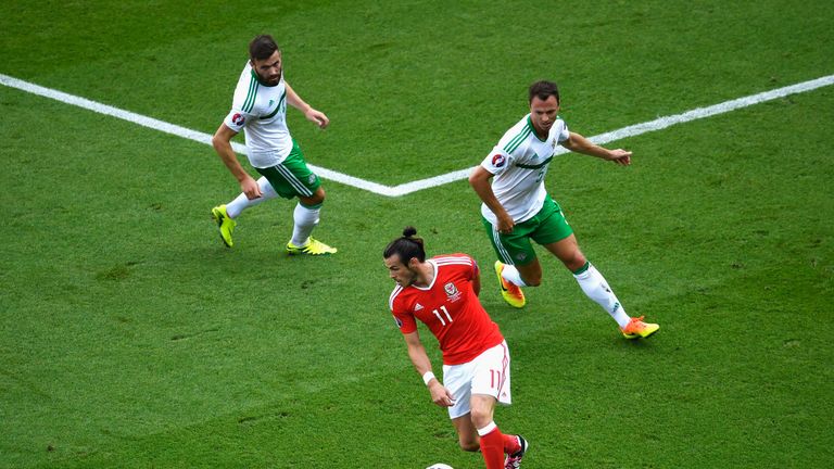 Stuart Dallas and Jonny Evans kept a close eye on Gareth Bale in the first half