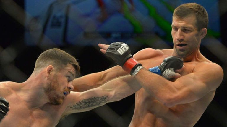 Michael Bisping knocked out Luke Rockhold in the first round to win the UFC middleweight title