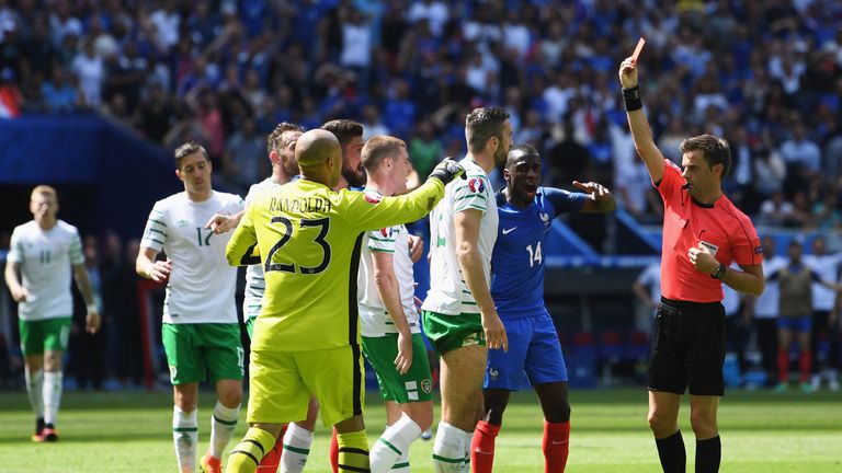 Shane Duffy is shown red for a foul on Griezmann