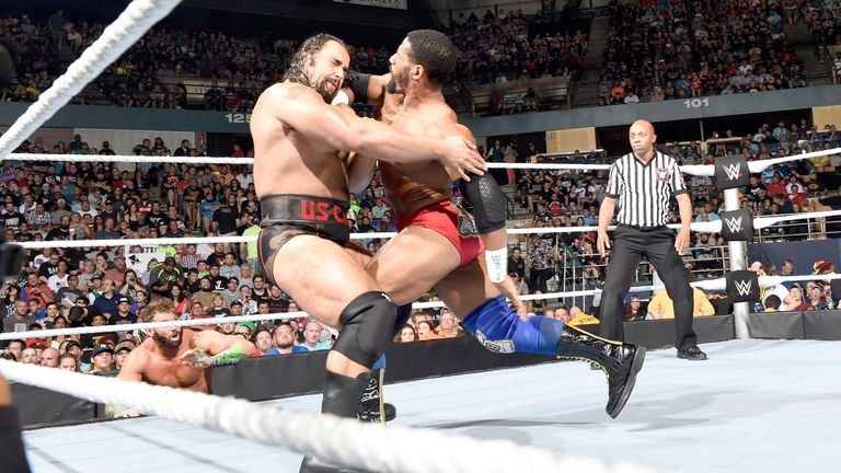 Darren Young attacks Rusev during a tag match