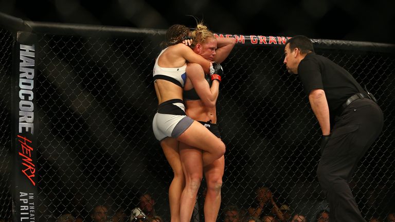Miesha Tate crucially grabs hold of Holm to eventually win her world title