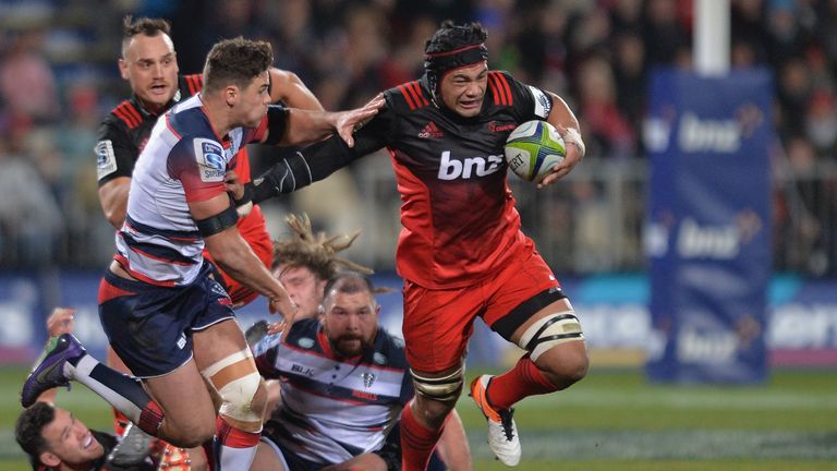 Jordan Taufua (right) on the charge for the Crusaders during the big win