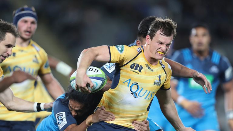 James Dargaville of the Brumbies is wrapped up by the Bles defence during the defeat