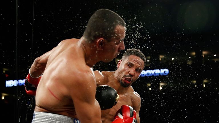 Andre Ward (right) hits Alexander Brand with a clubbing right