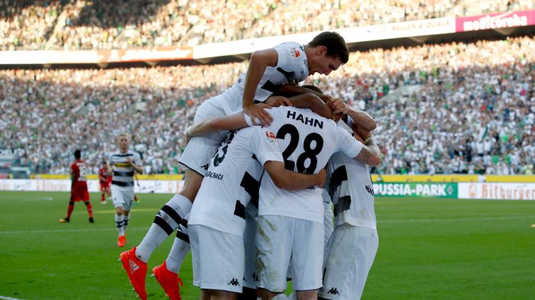 Andre Hahn celebrates opening the scoring for Borussia Moenchengladbach