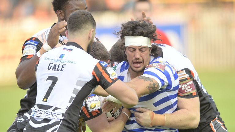 Anthony Gelling is wrapped up by the Castleford defence